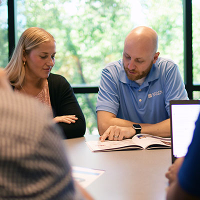 Employees in a meeting.